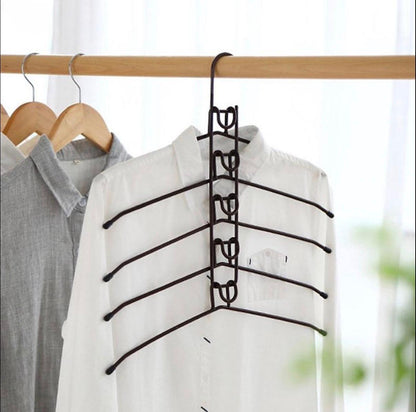 Multi-Tier Hanging Closet Organizer holding shirts