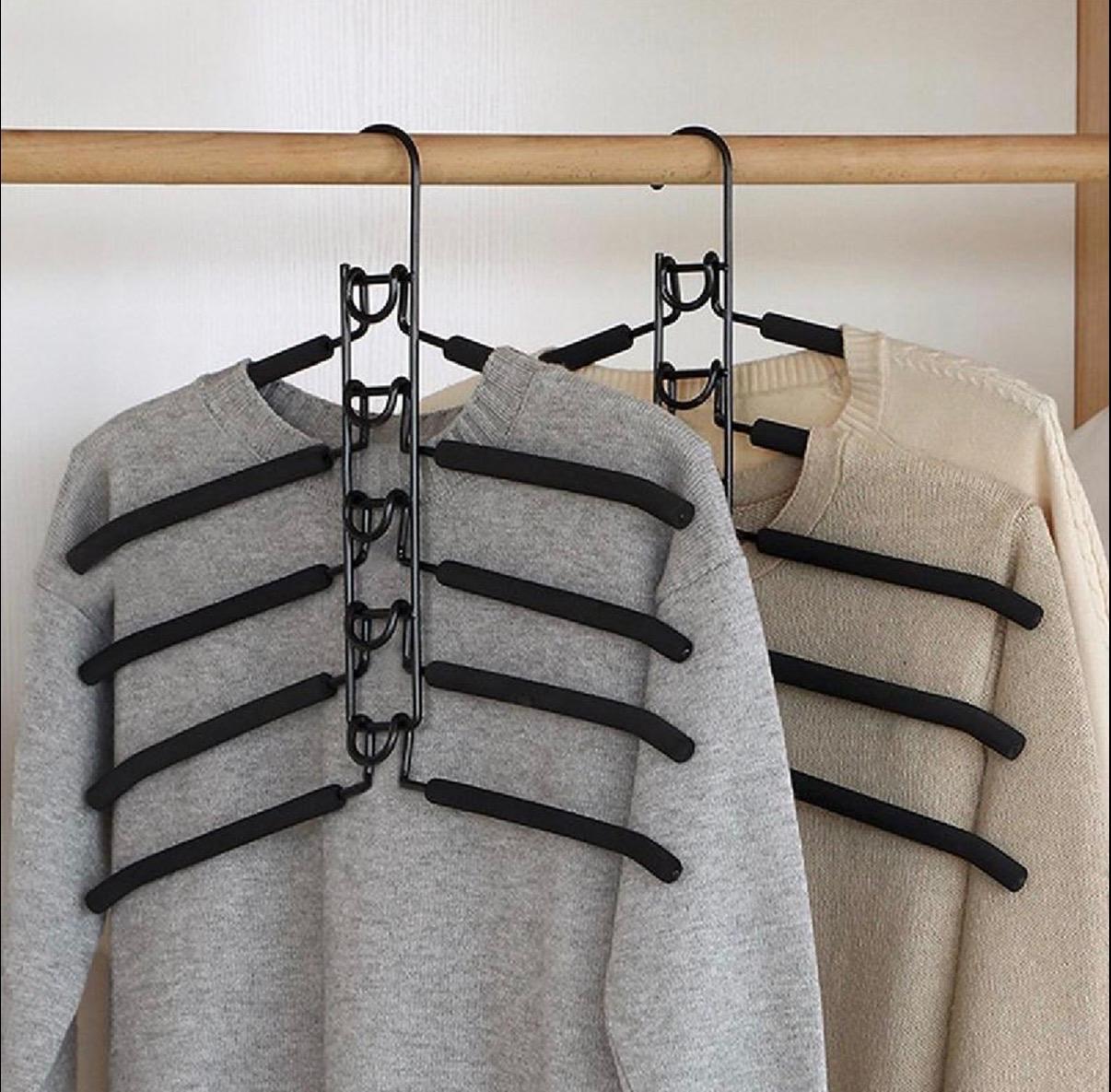 Multi-Tier Hanging Closet Organizer holding sweaters