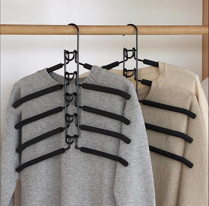Multi-Tier Hanging Closet Organizer holding sweaters