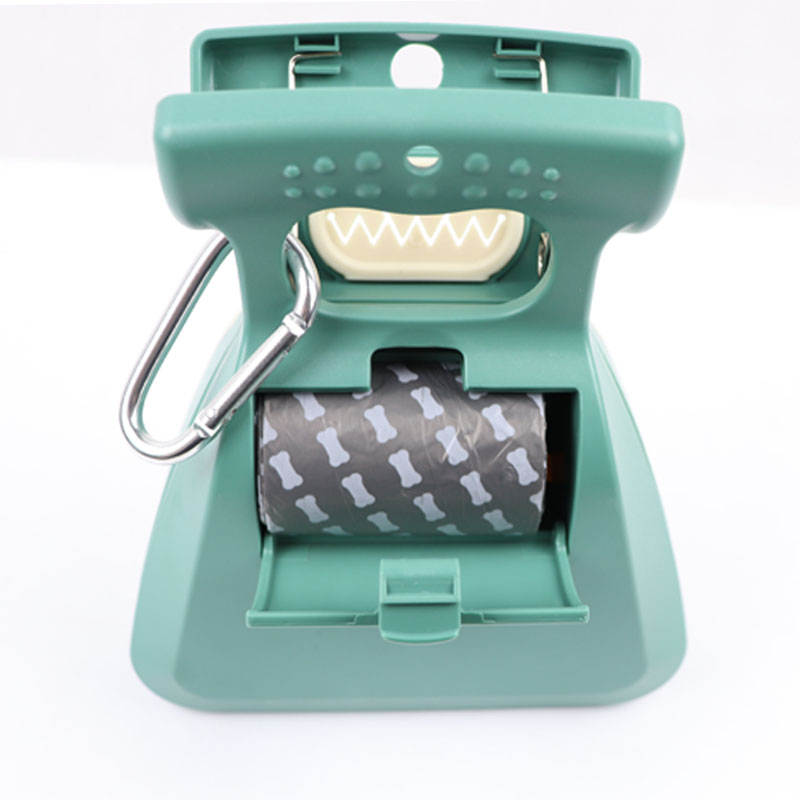Poop scooper with roll of waste bags loaded